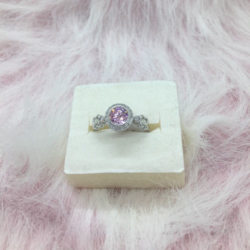 Pink crystal love knot ring
